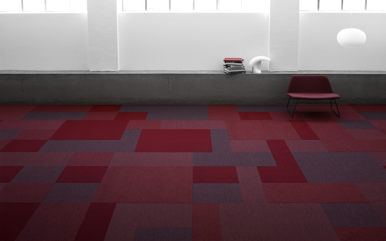 Carpet-tiles-for-hospitality-in-shades-of-red-and-grey