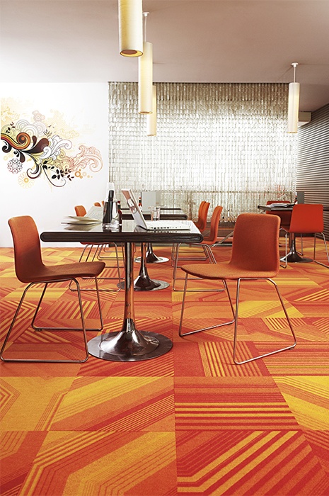 Colourful orange and yellow, striped carpet tiles