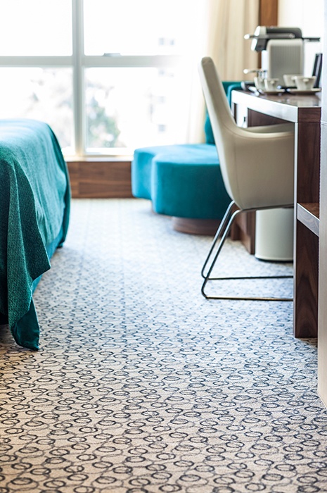 Patterned wall to wall ege carpet at the Epic Sana Lisboa Hotel Patterned wall to wall ege carpet at the Epic Sana Lisboa Hotel