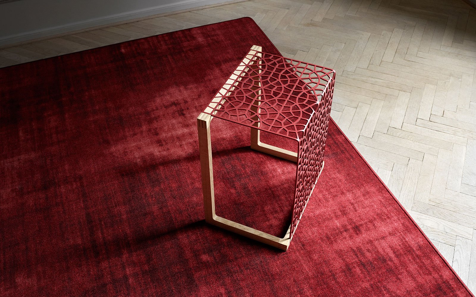 Deep red wall-to-wall carpet from ege's arts and crafts collection
